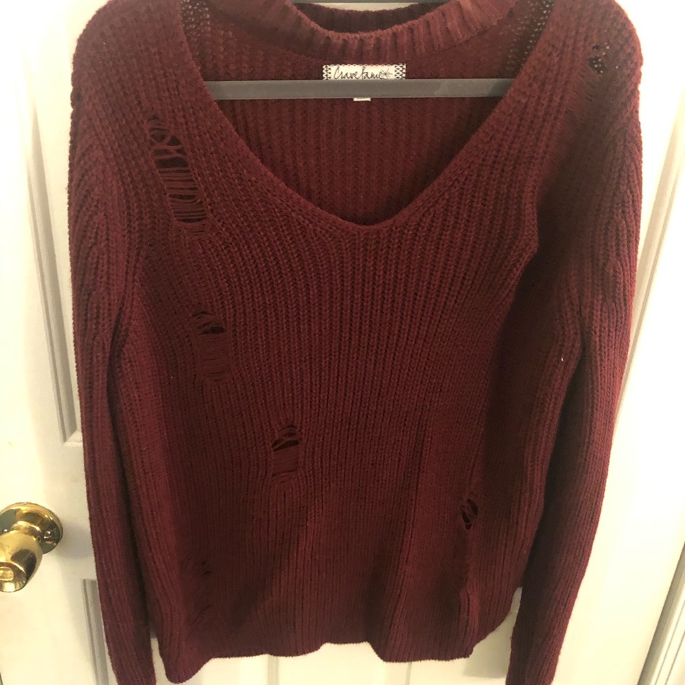 Red ripped design sweater